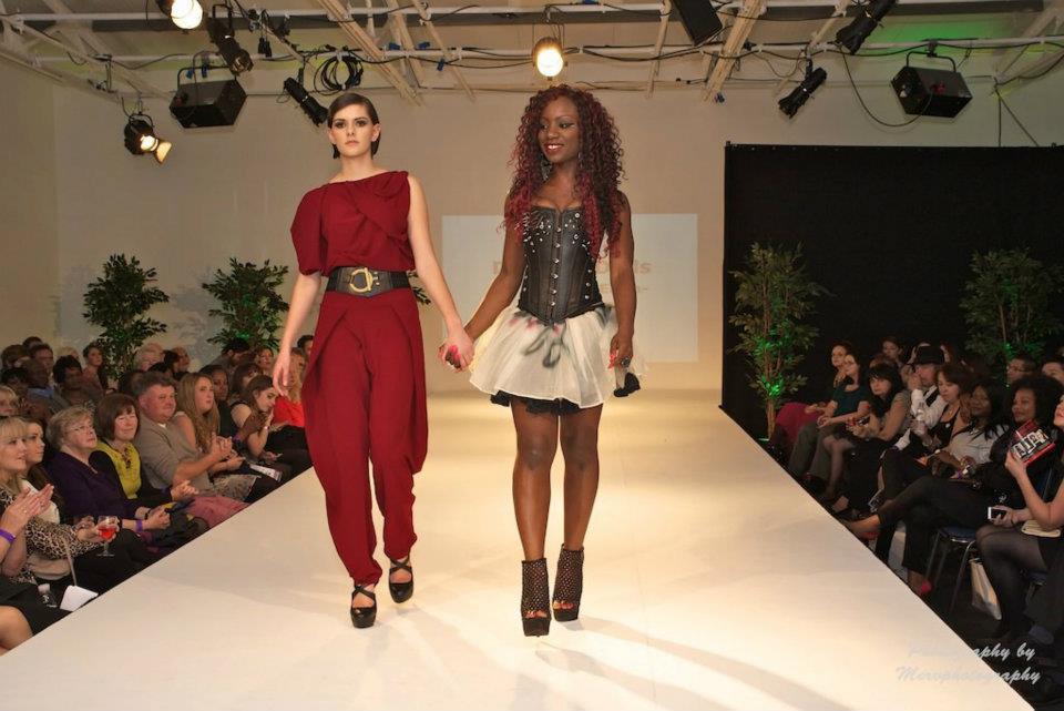 A catwalk down down memory lane. Brand owner Paulinah with model Ellie Reeves finale walk at the Midlands Fashion awards 2012 
