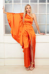 RIO orange winged one sleeve satin jumpsuit with thigh high slit sample sale